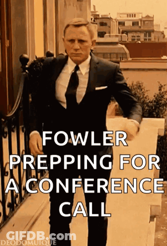 Man In Suit Preparing For Conference Call GIF