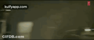 Man In Suit Punched By Another Man In Crowd GIF