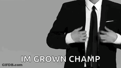 Man In Suit Putting On Jacket And Tie GIF