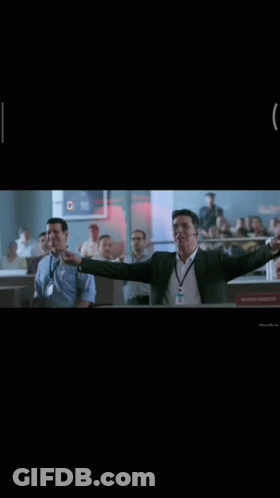 Man In Suit Raising Arms Saying Copy That GIF
