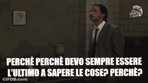 Man In Suit Raising Arms Saying Perche Perche Devo Sempre Essere GIF