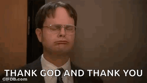 Man In Suit Raising Arms Saying Thank You GIF
