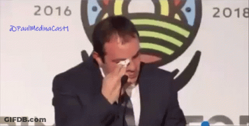 Man In Suit Raising Hands Saying America GIF