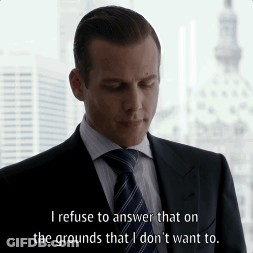 Man In Suit Refusing To Answer GIF