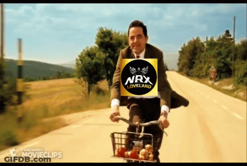 Man In Suit Riding Bike With NRX Loveland Logo GIF