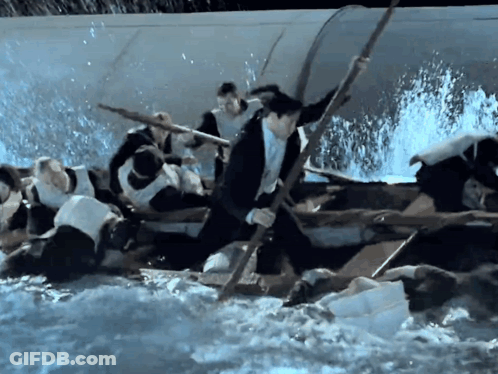 Man In Suit Rowing Boat With Stick GIF
