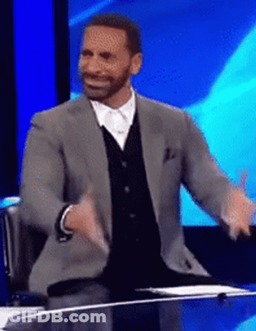 Man In Suit Rubbing Hands GIF