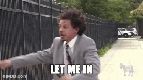 Man In Suit Running With Let Me In GIF