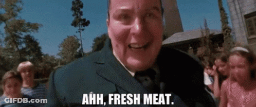 Man In Suit Saying Ahh Fresh Meat GIF