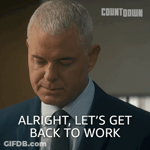 Man In Suit Saying Alright Let's Get Back To Work GIF