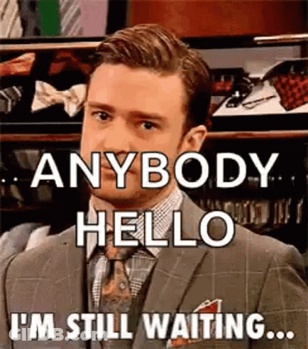 Man In Suit Saying Anybody Hello I'm Still Waiting GIF