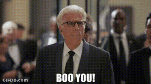 Man In Suit Saying Boo You In Crowd GIF