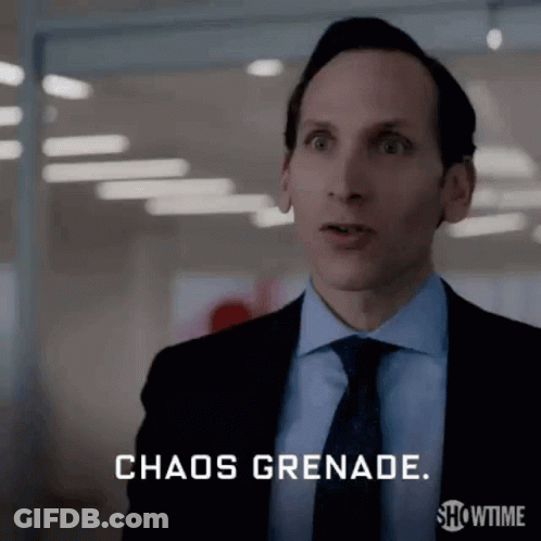 Man In Suit Saying Chaos Grenade GIF