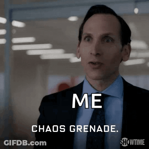 Man In Suit Saying Chaos Grenade GIF