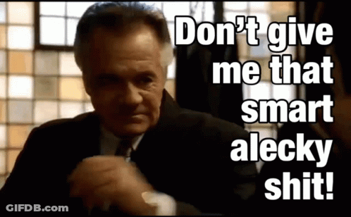 Man In Suit Saying Don't Give Me That Smart Alecky Shit GIF
