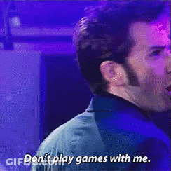 Man In Suit Saying Don't Play Games GIF