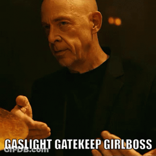 Man In Suit Saying Gaslight Gatekeep Girlboss GIF