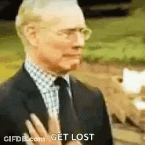 Man In Suit Saying Get Lost GIF