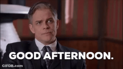 Man In Suit Saying Good Afternoon GIF