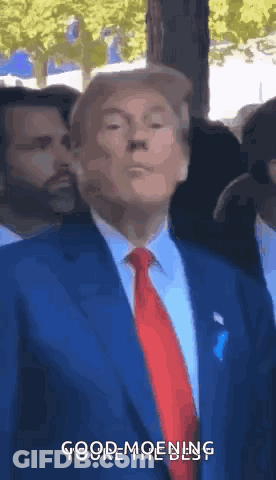 Man In Suit Saying Good Morning To Crowd GIF