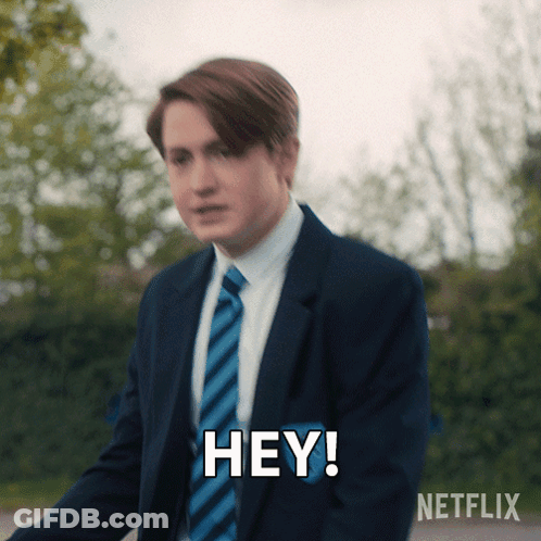 Man In Suit Saying Hey GIF
