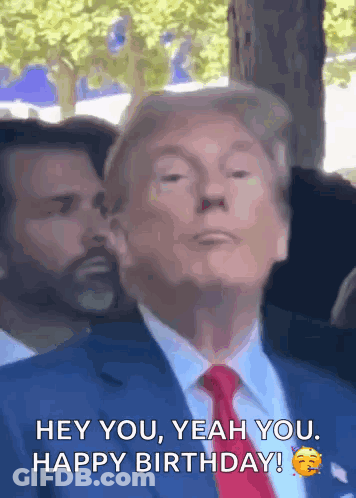 Man In Suit Saying Hey You Happy Birthday GIF