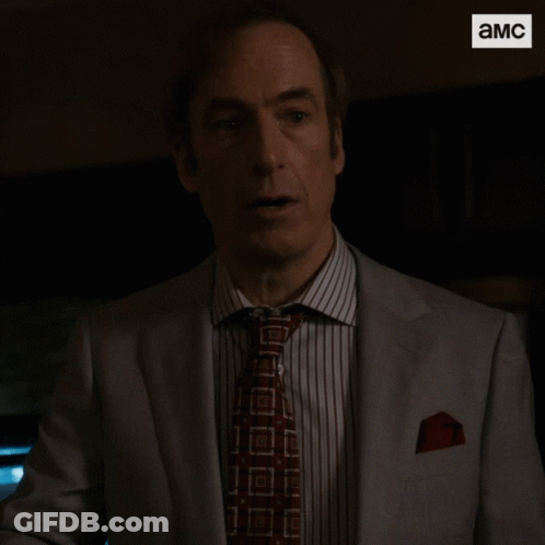 Man In Suit Saying Holy Shit GIF
