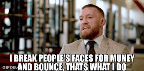 Man In Suit Saying I Break Faces For Money GIF