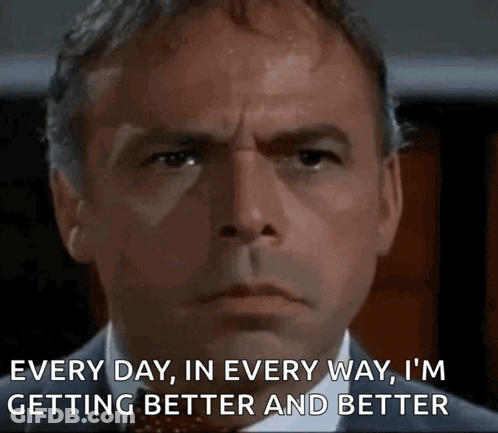 Man In Suit Saying I'm Getting Better GIF