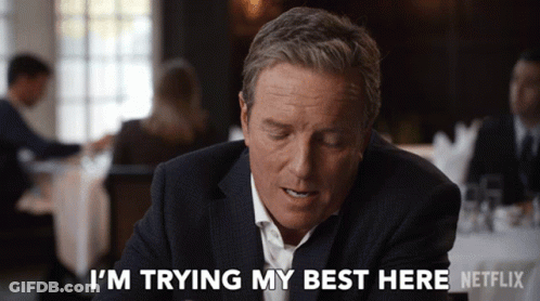 Man In Suit Saying I'm Trying My Best Here GIF