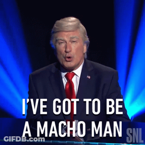 Man In Suit Saying I've Got To Be A Macho Man GIF