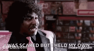 Man In Suit Saying I Was Scared But I Held My Own GIF