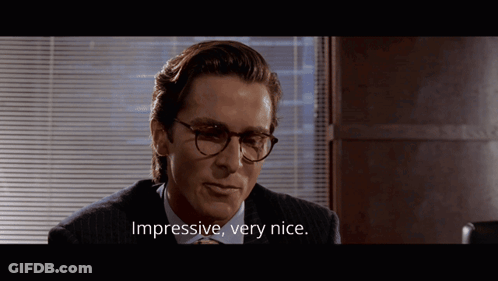 Man In Suit Saying Impressive GIF