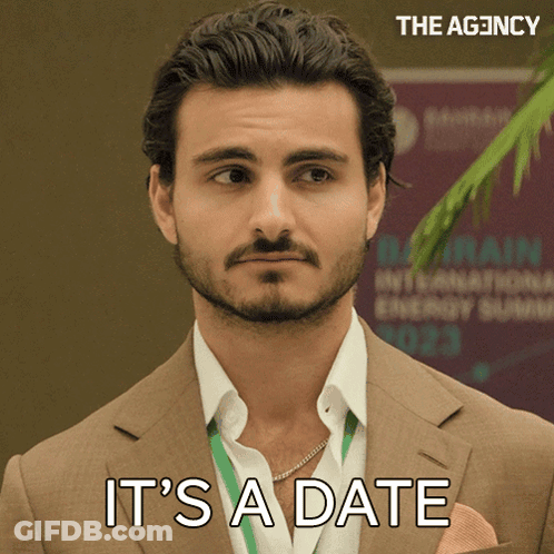 Man In Suit Saying It's A Date GIF