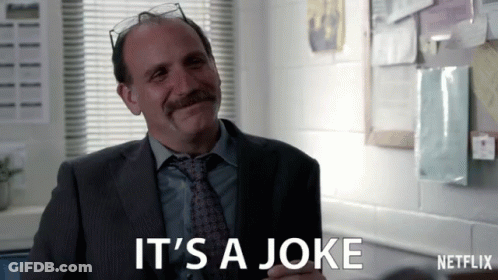 Man In Suit Saying It's A Joke GIF