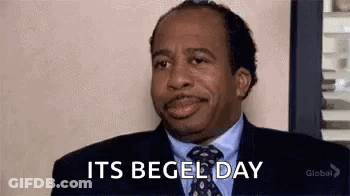 Man In Suit Saying It's Begel Day GIF