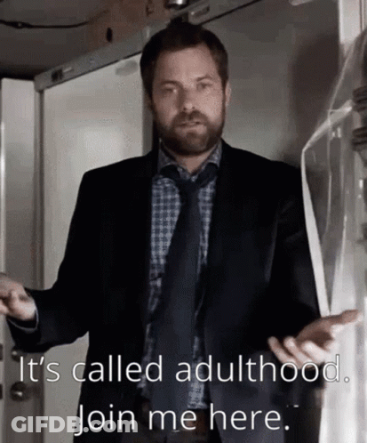 Man In Suit Saying It's Called Adulthood Join Me Here GIF