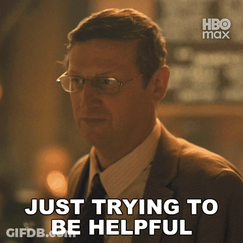 Man In Suit Saying Just Trying To Be Helpful GIF