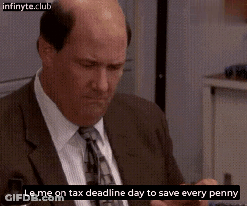 Man In Suit Saying Le Me On Tax Deadline Day GIF