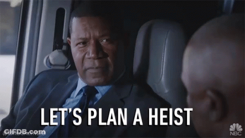 Man In Suit Saying Let's Plan A Heist In A Car GIF
