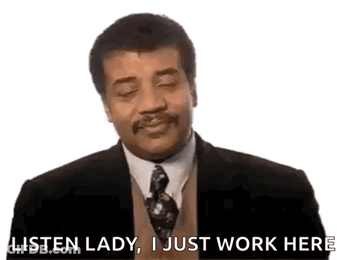 Man In Suit Saying Listen Lady I Just Work Here GIF
