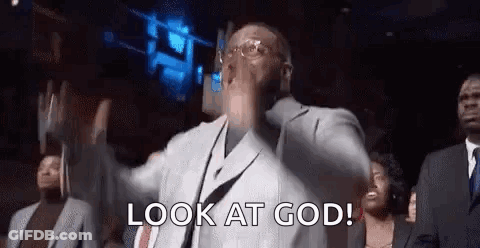 Man In Suit Saying Look At God GIF