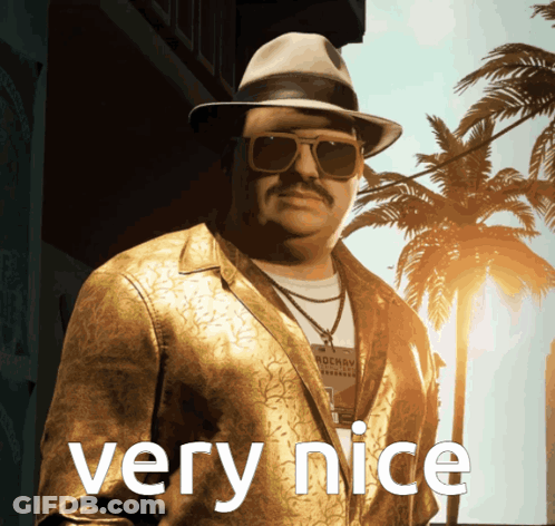 Man In Suit Saying Nice GIF