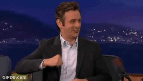 Man In Suit Saying Nudge GIF