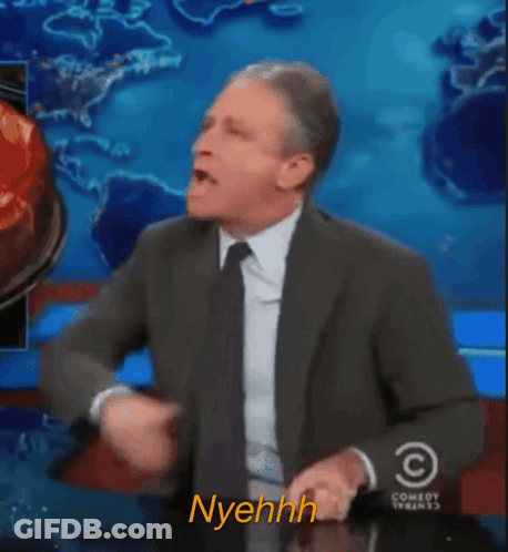 Man In Suit Saying Nyehhh GIF