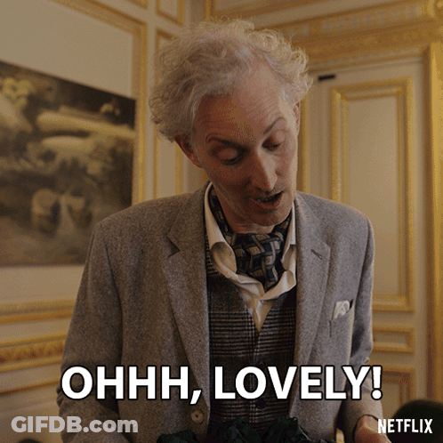 Man In Suit Saying Ohh Lovely GIF
