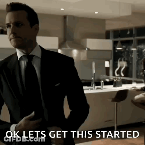 Man In Suit Saying OK Lets Get This Started GIF