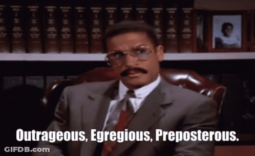 Man In Suit Saying Outrageous Egregious Preposterous GIF