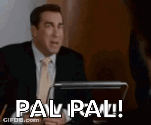 Man In Suit Saying Pal Pal At Desk GIF
