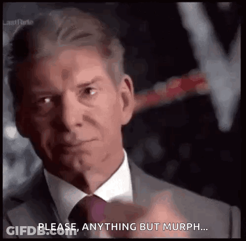 Man In Suit Saying Please Anything But Murph GIF